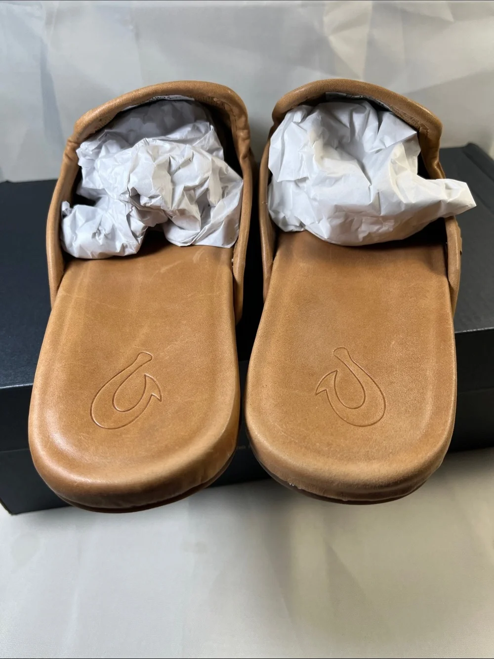 OluKai women’s Tan Woven Leather Slip-On Loafers